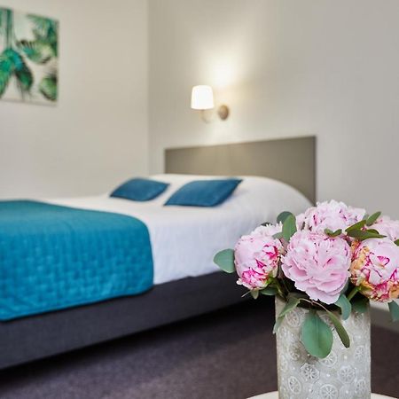 Hotel De La Pommeraie เลอม็องส์ ภายนอก รูปภาพ
