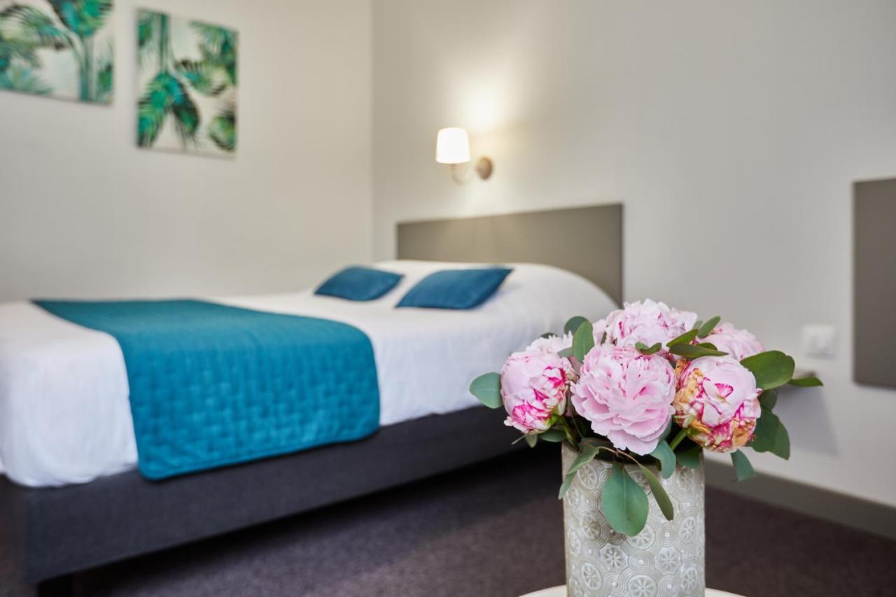 Hotel De La Pommeraie เลอม็องส์ ภายนอก รูปภาพ