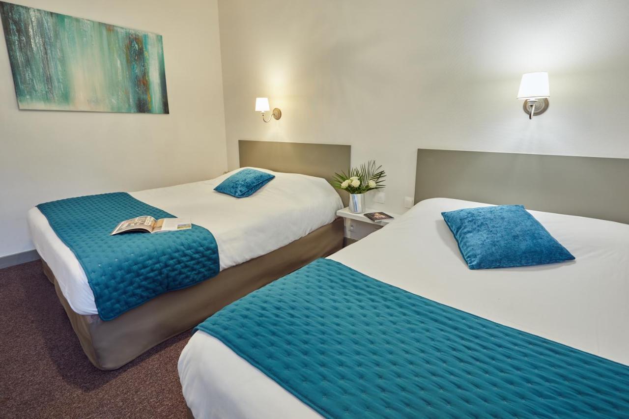 Hotel De La Pommeraie เลอม็องส์ ภายนอก รูปภาพ