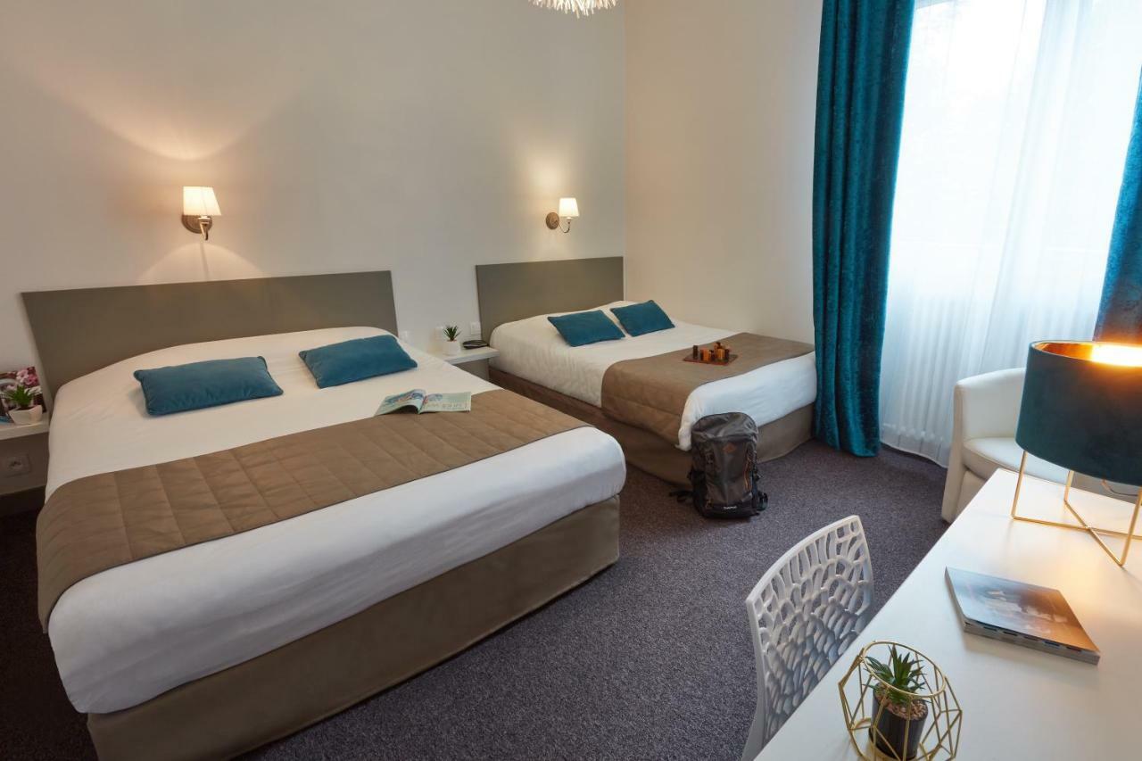 Hotel De La Pommeraie เลอม็องส์ ภายนอก รูปภาพ